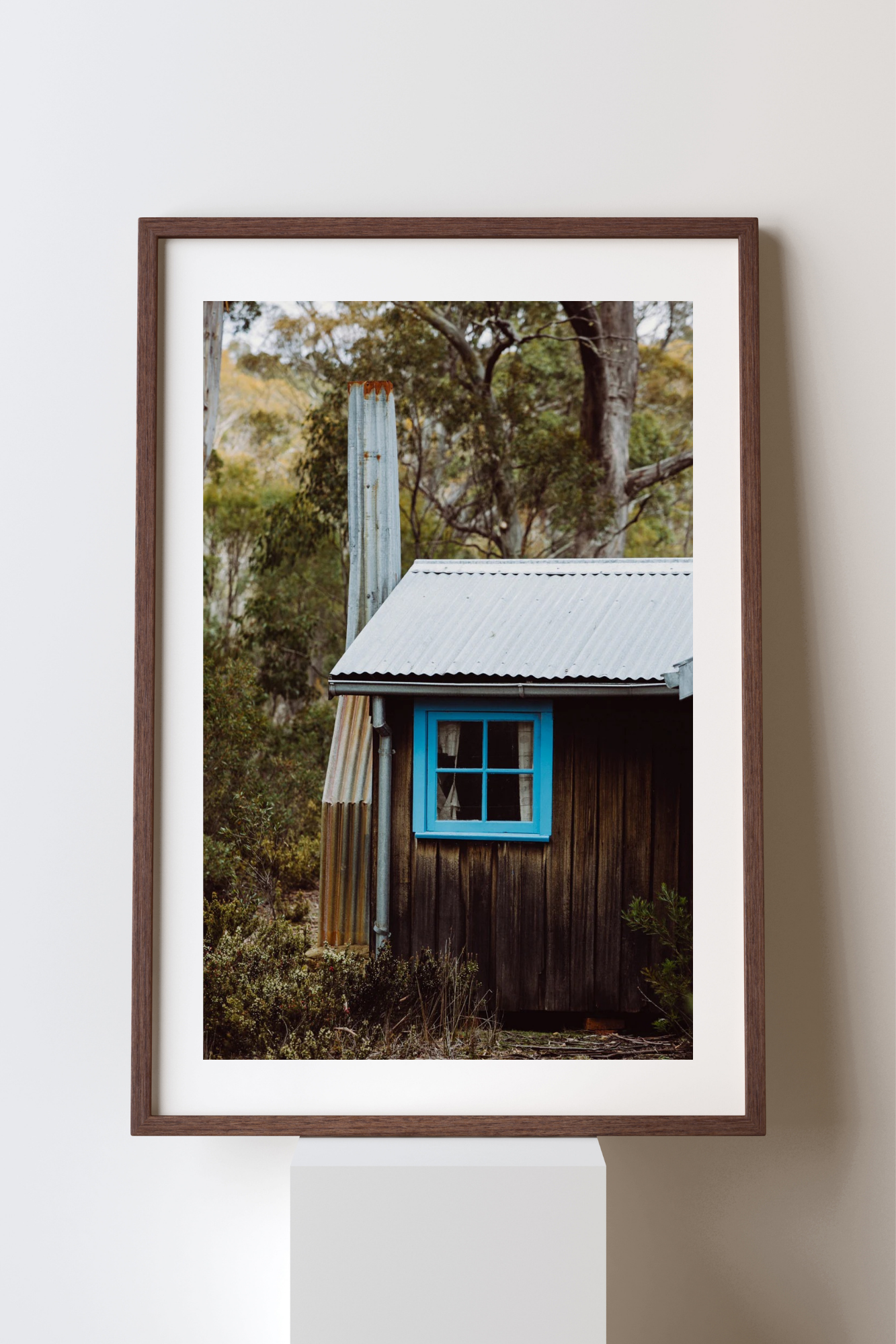 Emily O'Brien photographic print of a cozy cabin in the woods, showcasing detailed woodland scenery and rustic charm.